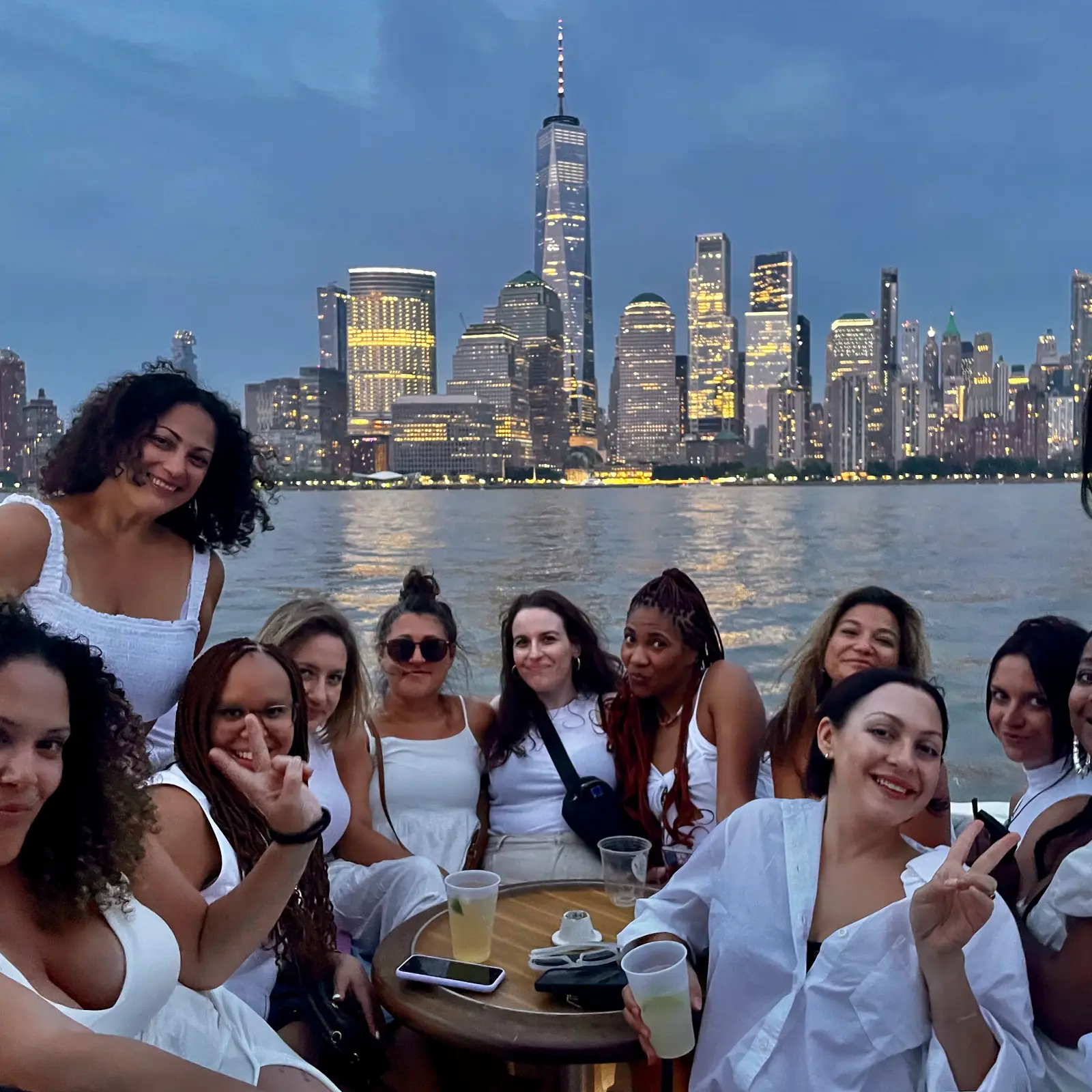 The captain and crew aboard a New York Charters boat near the Statue of Liberty