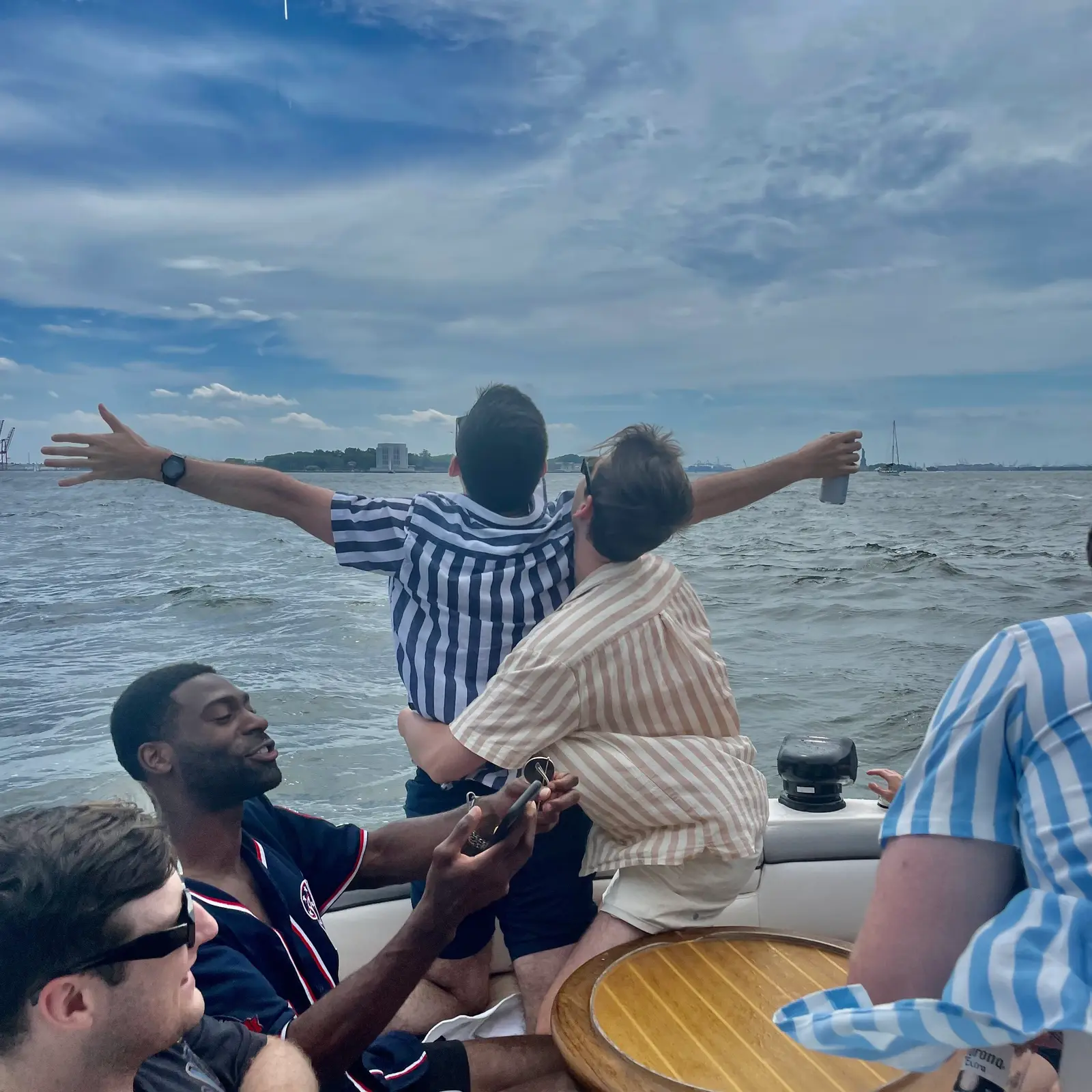A family charter trip with the New York City skyline in the background
